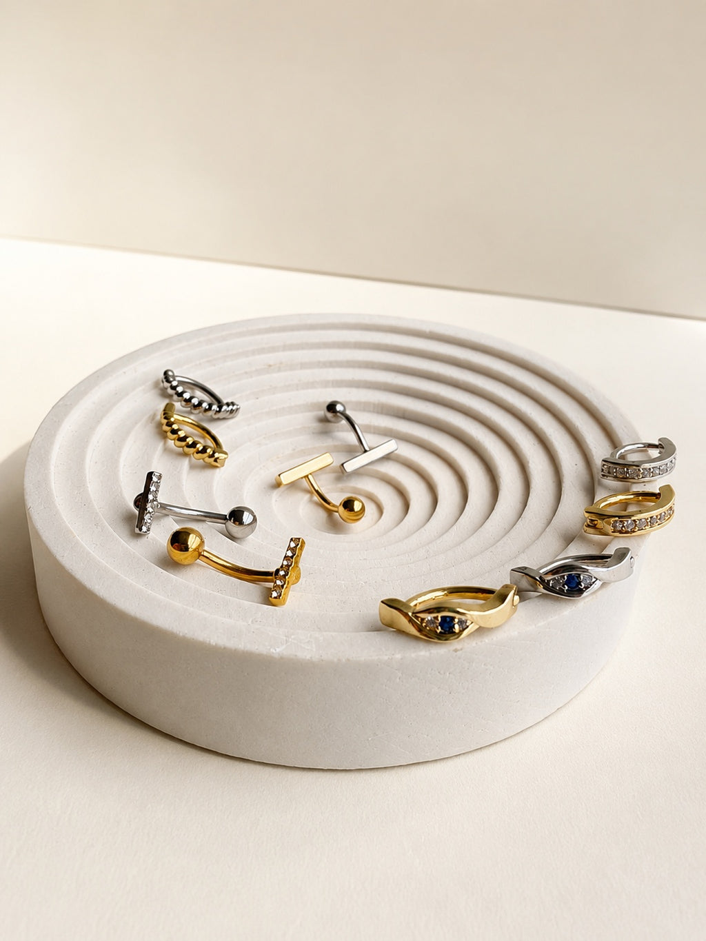 Non tarnish belly button rings in 18K gold-plated stainless steel.