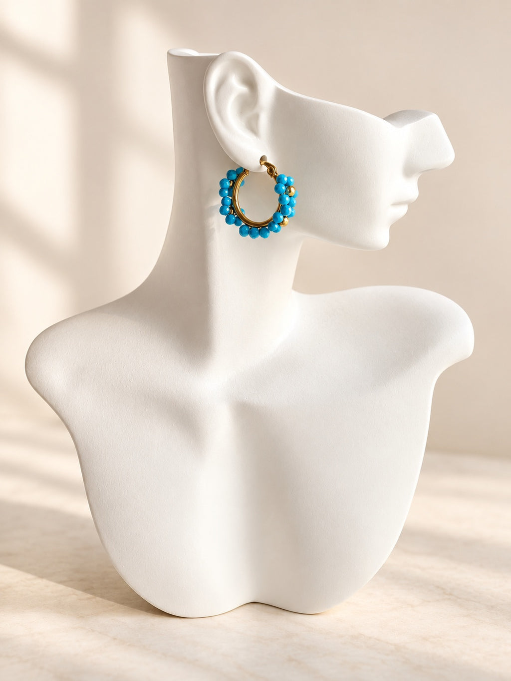 Turquoise statement hoop earrings in gold