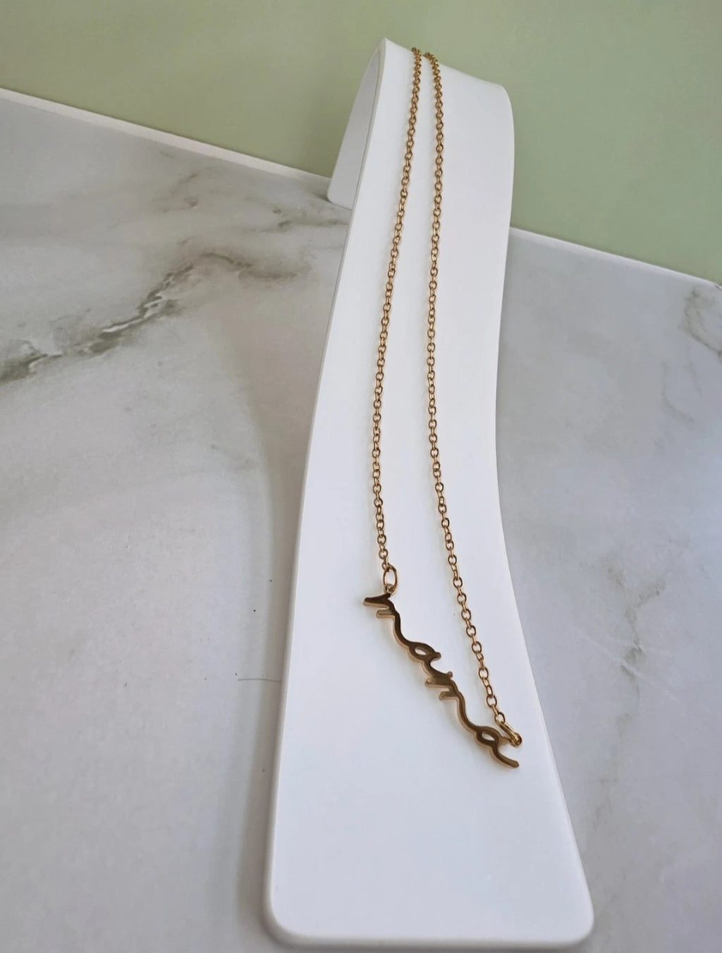 Minimalist Mama necklace crafted in 18K gold plating.