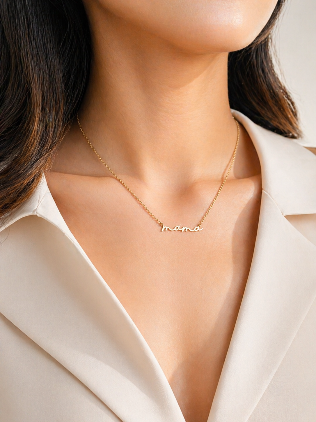 Dainty Mama necklace with an 18K gold-plated finish.