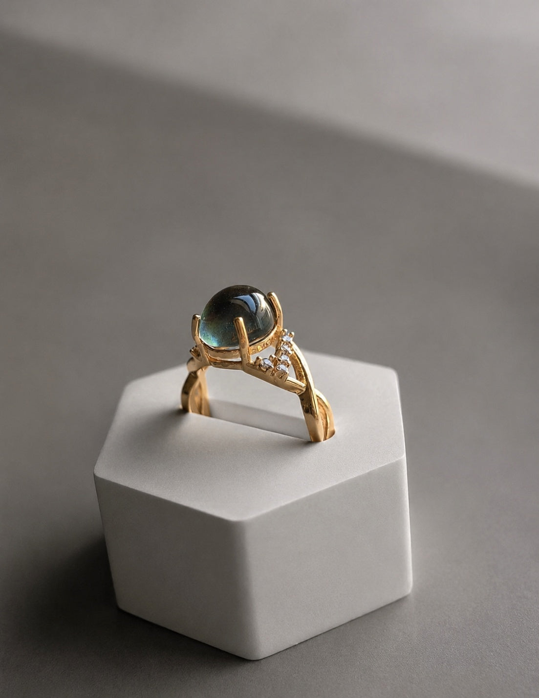 Adjustable gold mood ring that changes color with body temperature.
