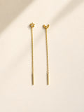 Silver celestial threader earrings featuring moon and star charms.