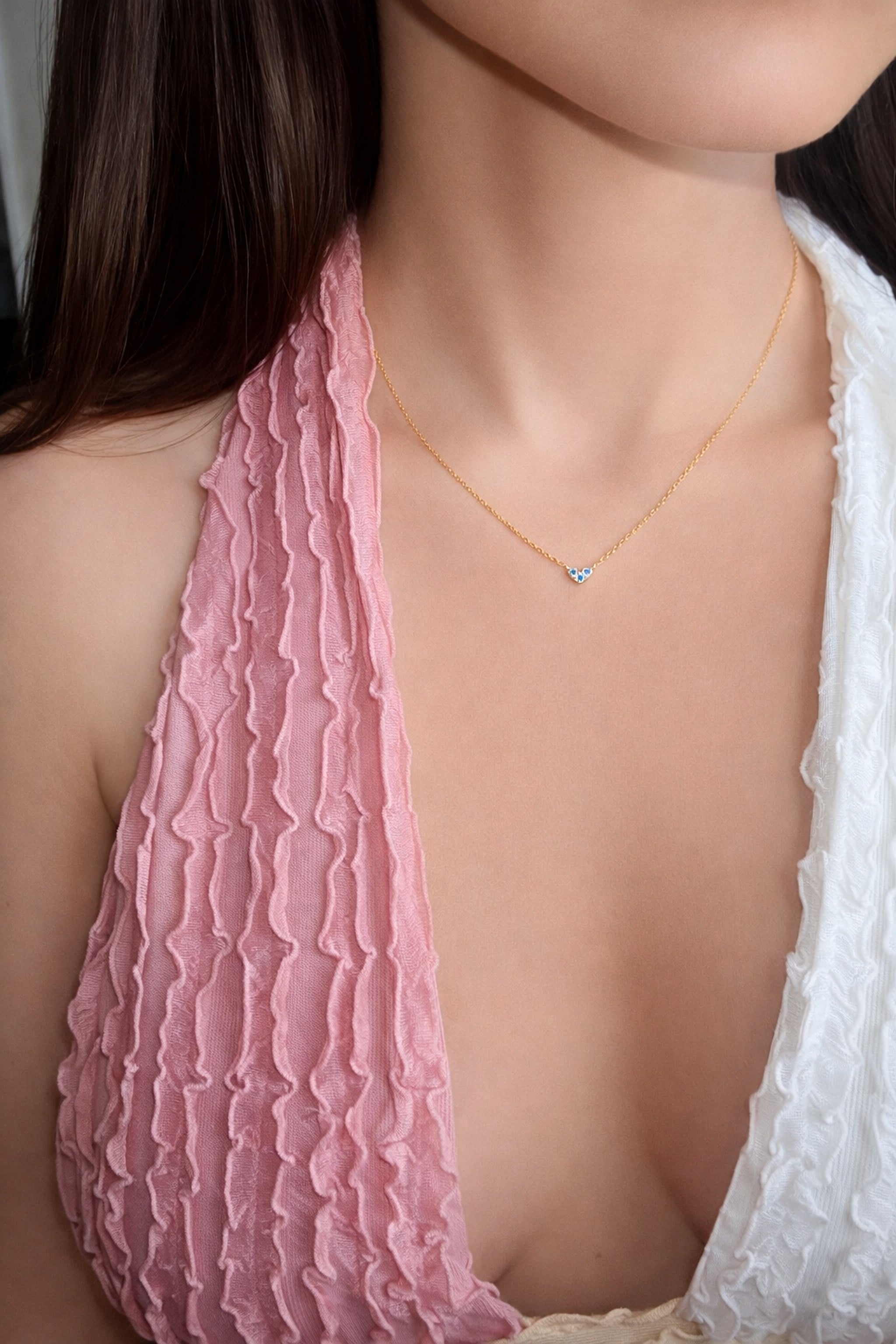 Elegant heart necklace featuring a sparkling birthstone on an 18K gold-plated sterling silver chain.