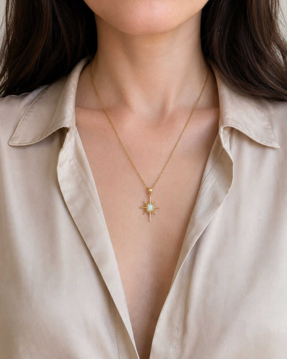 Opal North Star necklace with an 18K gold-plated celestial pendant.