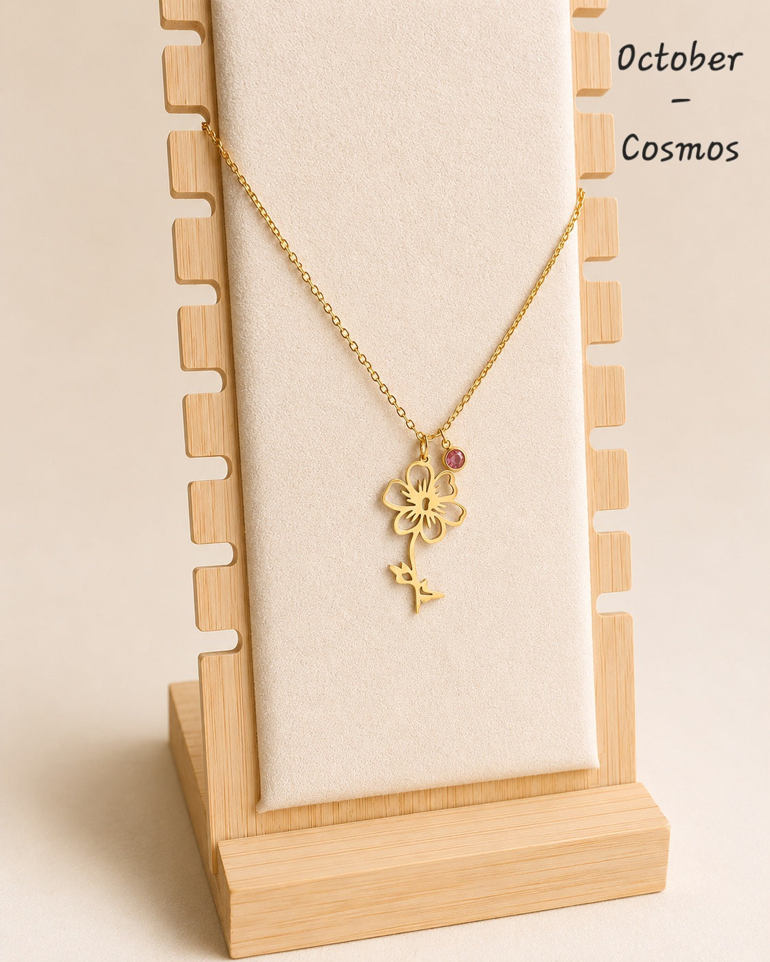 18K gold-plated birth flower necklace featuring an engraved floral pendant and birthstone.