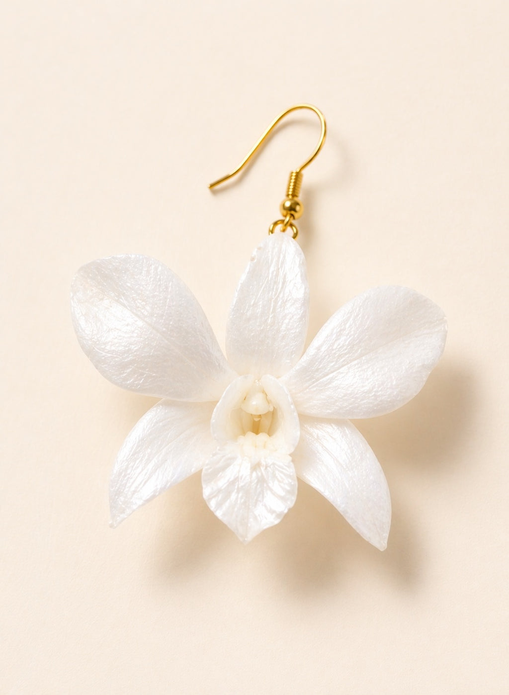 Botanical statement earrings made with genuine preserved orchid flowers.