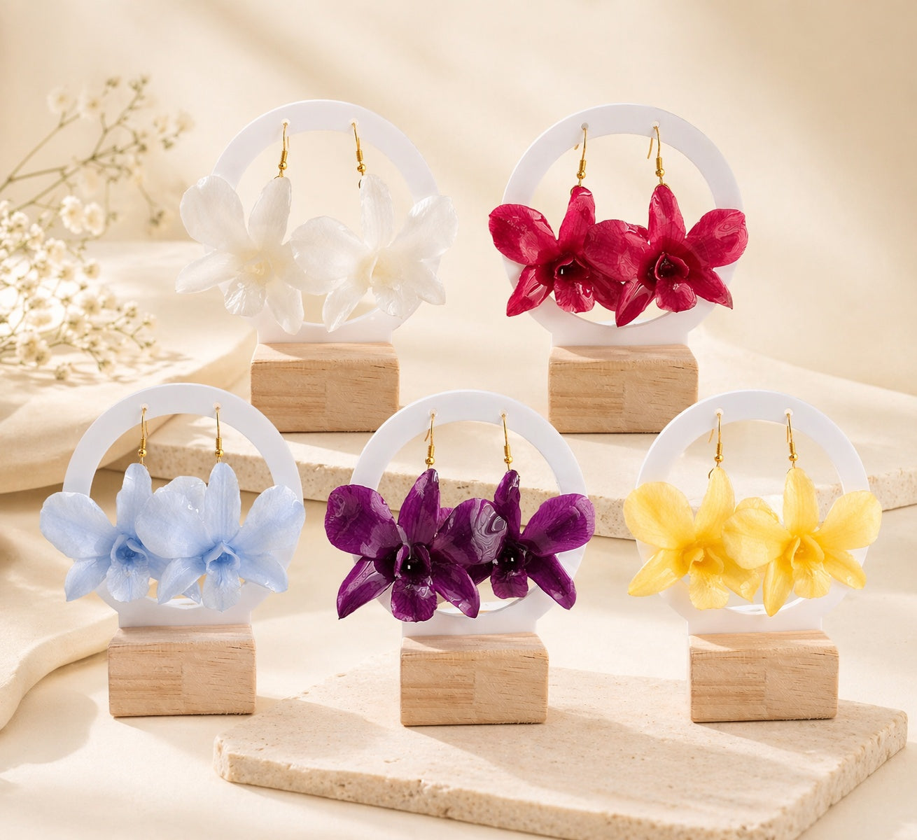 Floral statement earrings featuring genuine orchid blossoms.