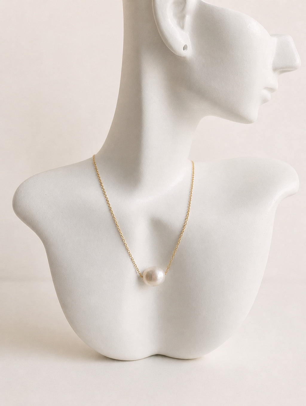 Waterproof freshwater pearl necklace with an 18K gold-plated chain.