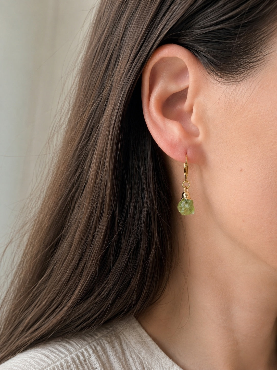 Natural aquamarine gemstone hoop earrings with an elegant gold-plated finish.