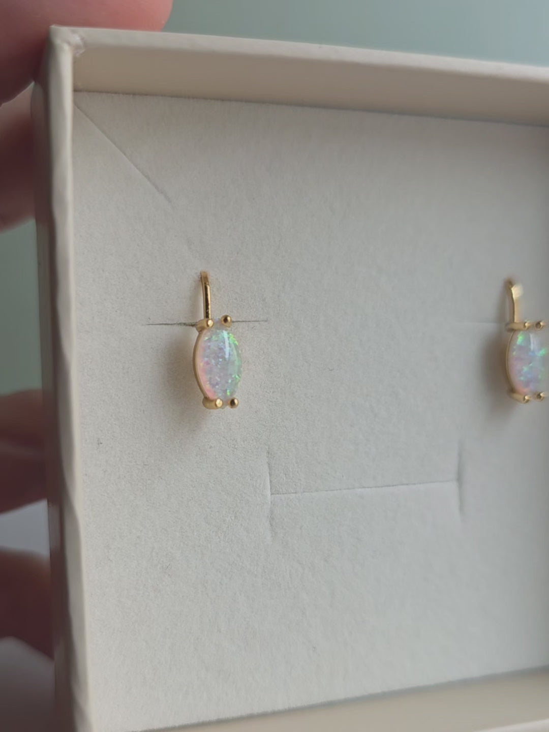 Marquise opal hoop earrings with elegant 14K gold-plated and silver-plated finishes.