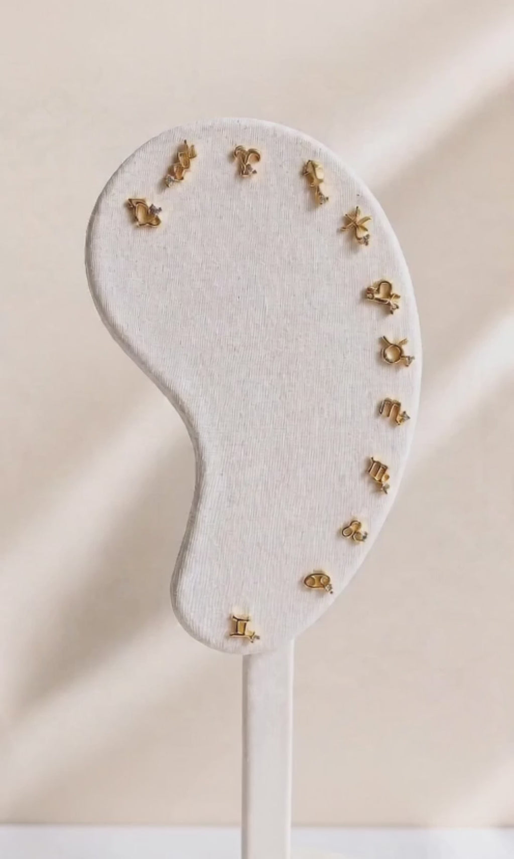 Women's hypoallergenic zodiac flat back earring for everyday wear.