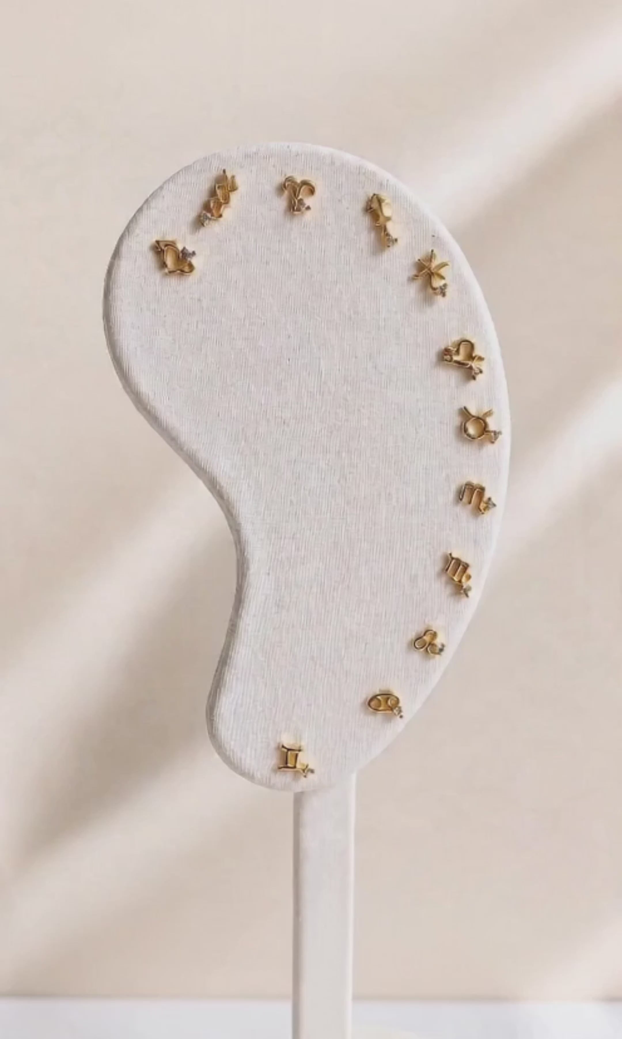 Women's hypoallergenic zodiac flat back earring for everyday wear.