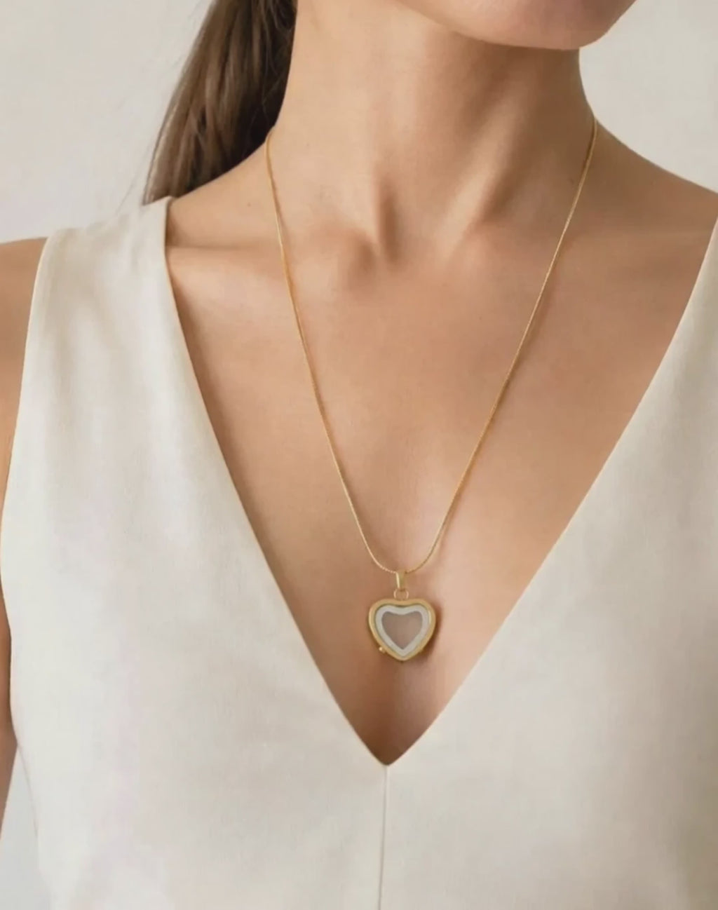 Heart urn pendant for ashes with a timeless design.