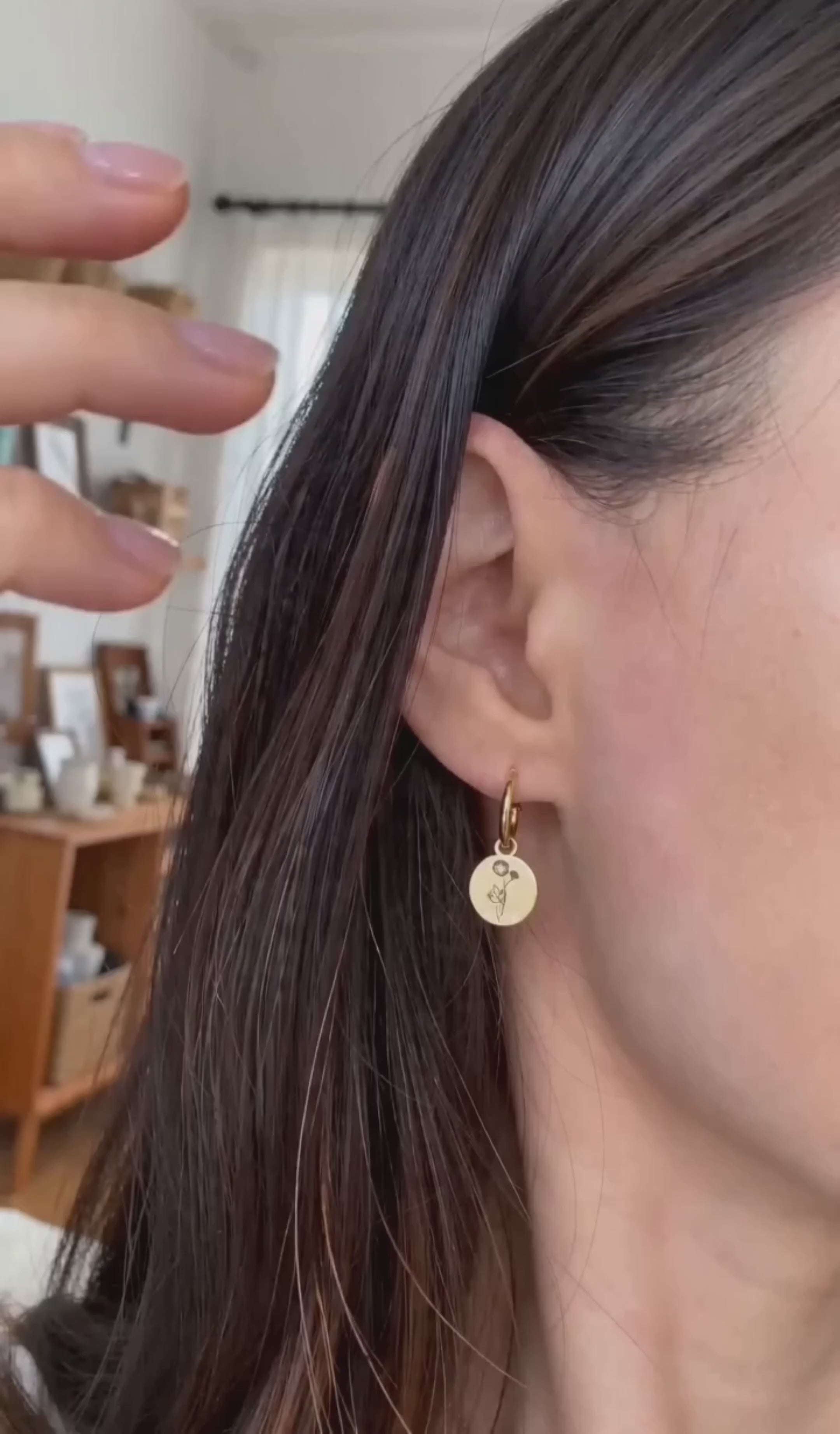 18K gold-plated birth month huggie hoop earrings featuring engraved birth flowers.