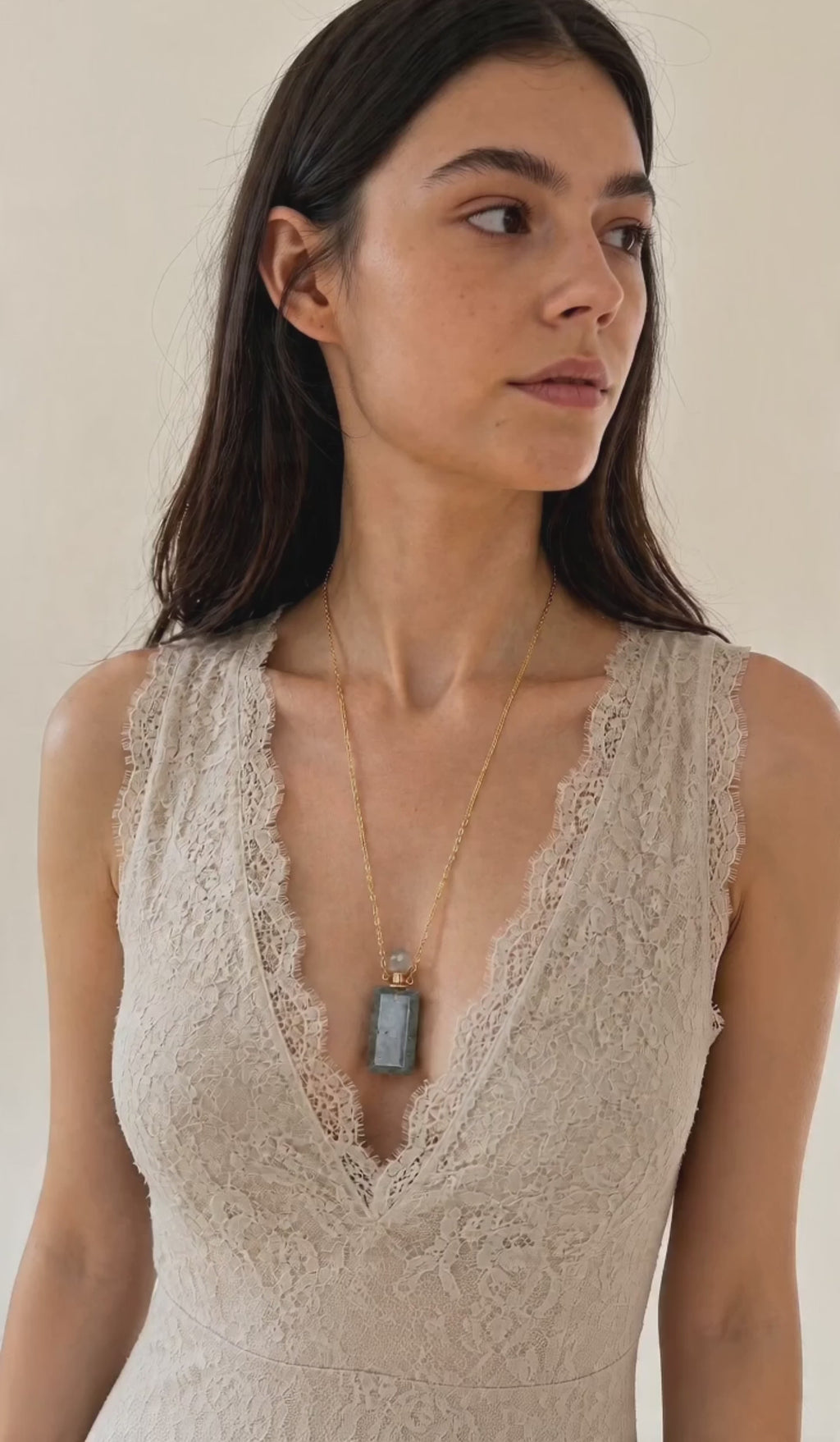 14K gold-plated vial necklace with a refillable crystal perfume bottle pendant available in Tiger's Eye, Clear Quartz, Rose Quartz, Green Aventurine, Black Onyx, and Lapis Lazuli.