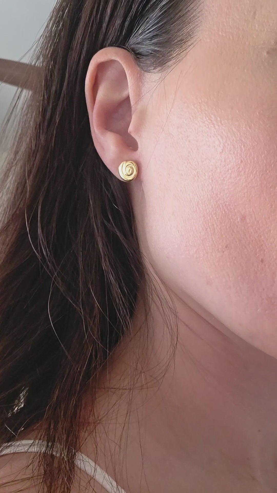Unique spiral stud earrings perfect for thoughtful gifting.