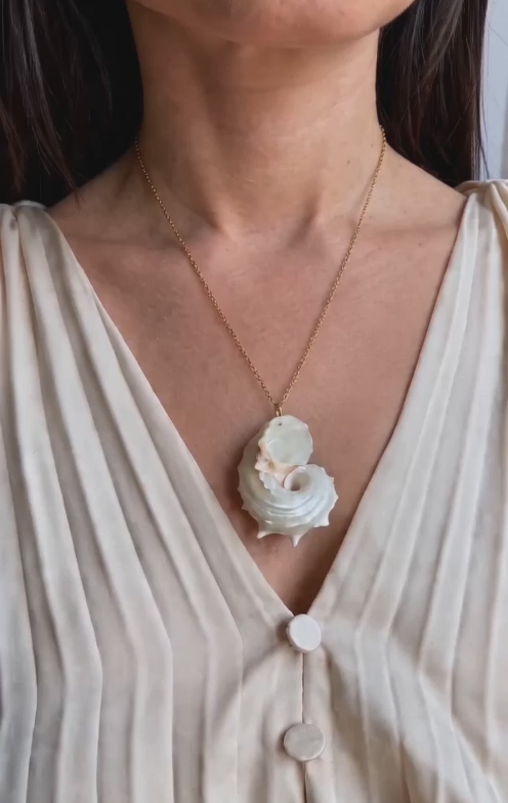 Elegant real shell necklace with an 18K gold-plated non-tarnish finish.