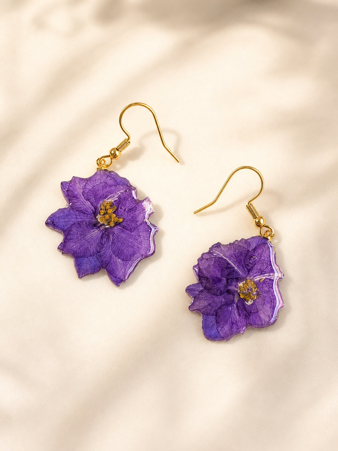 Purple hydrangea floral earrings with a 14K gold-plated finish.