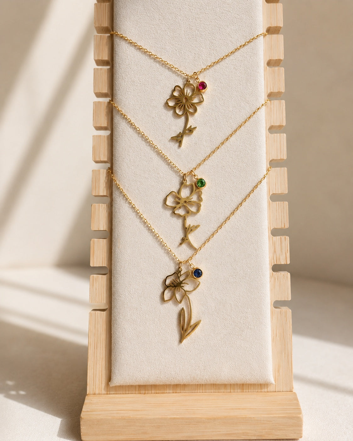 Waterproof birth flower necklace with matching birthstone in 18K gold-plated stainless steel.