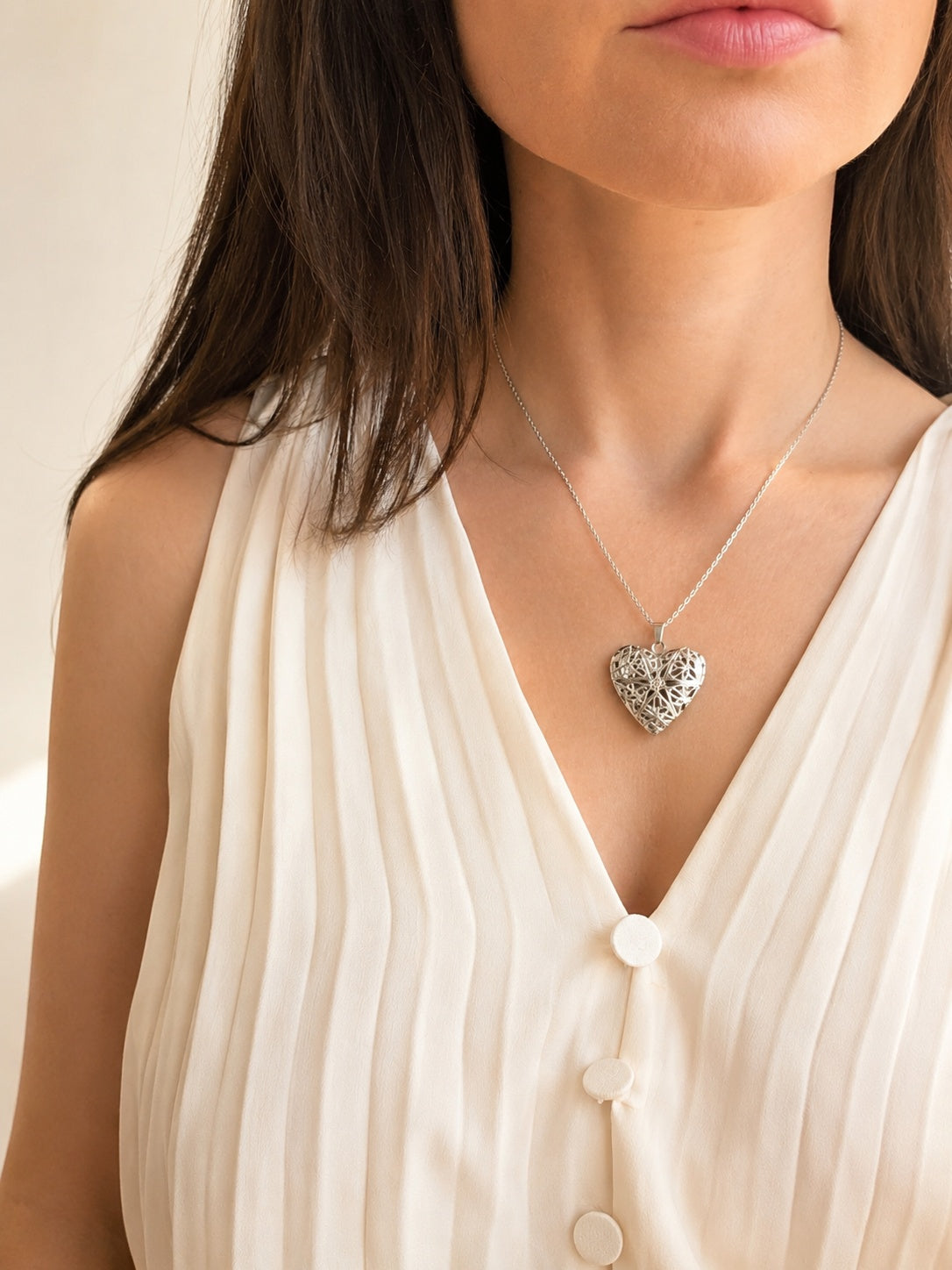 Keepsake heart locket pendant necklace for everyday wear.