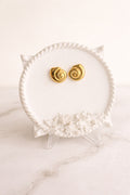 18K gold-plated spiral stud earrings with a polished modern design.