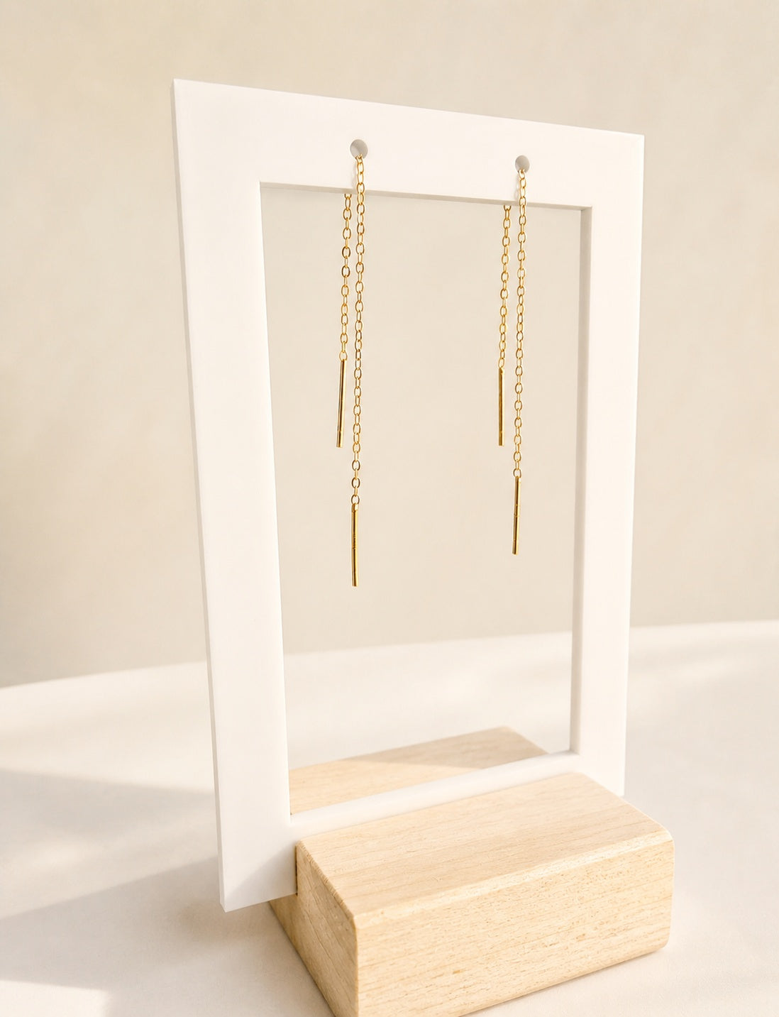 Threader chain bar earrings crafted from sterling silver with 18K gold plating.