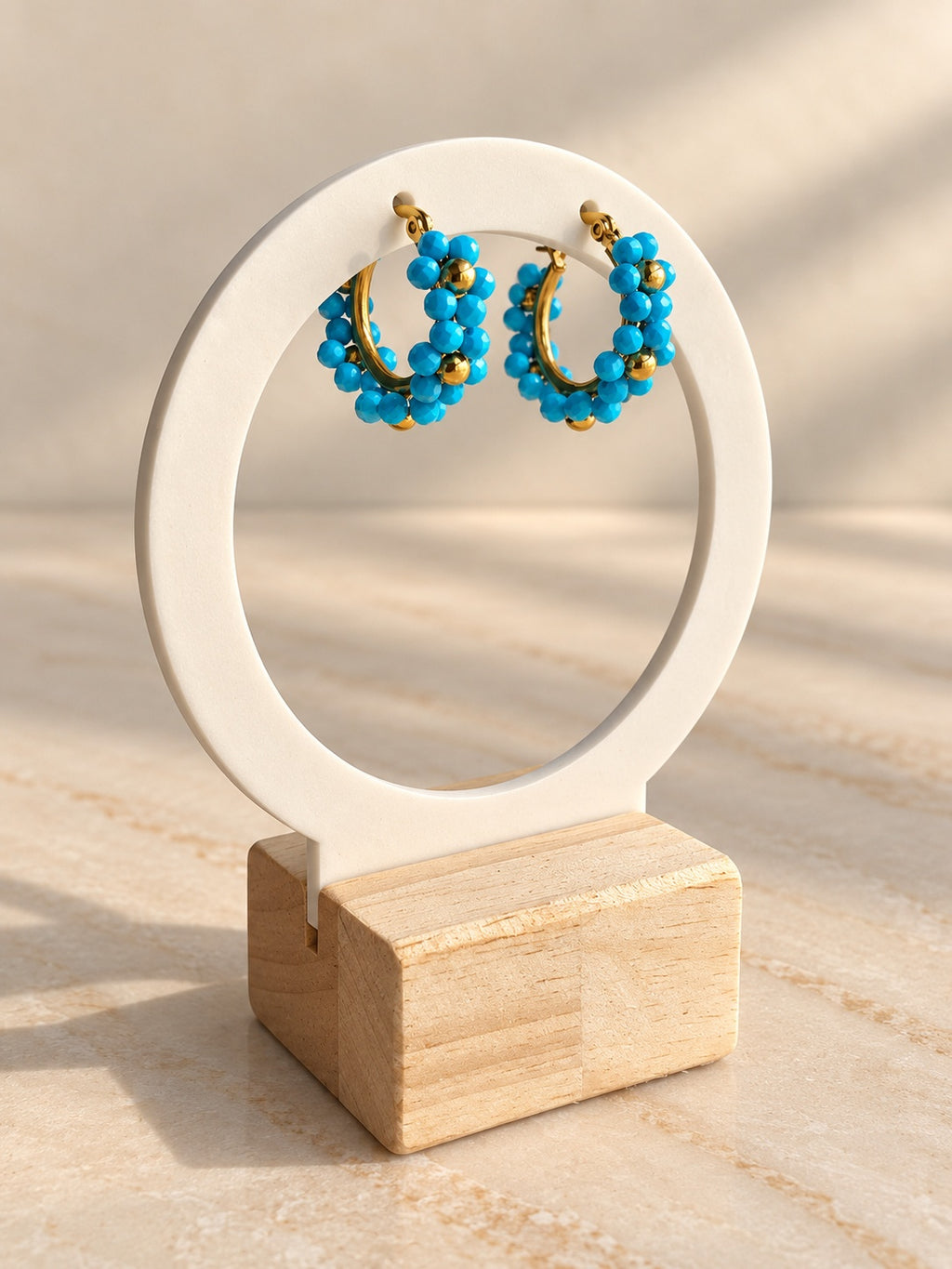 Blue beaded gold hoop earrings