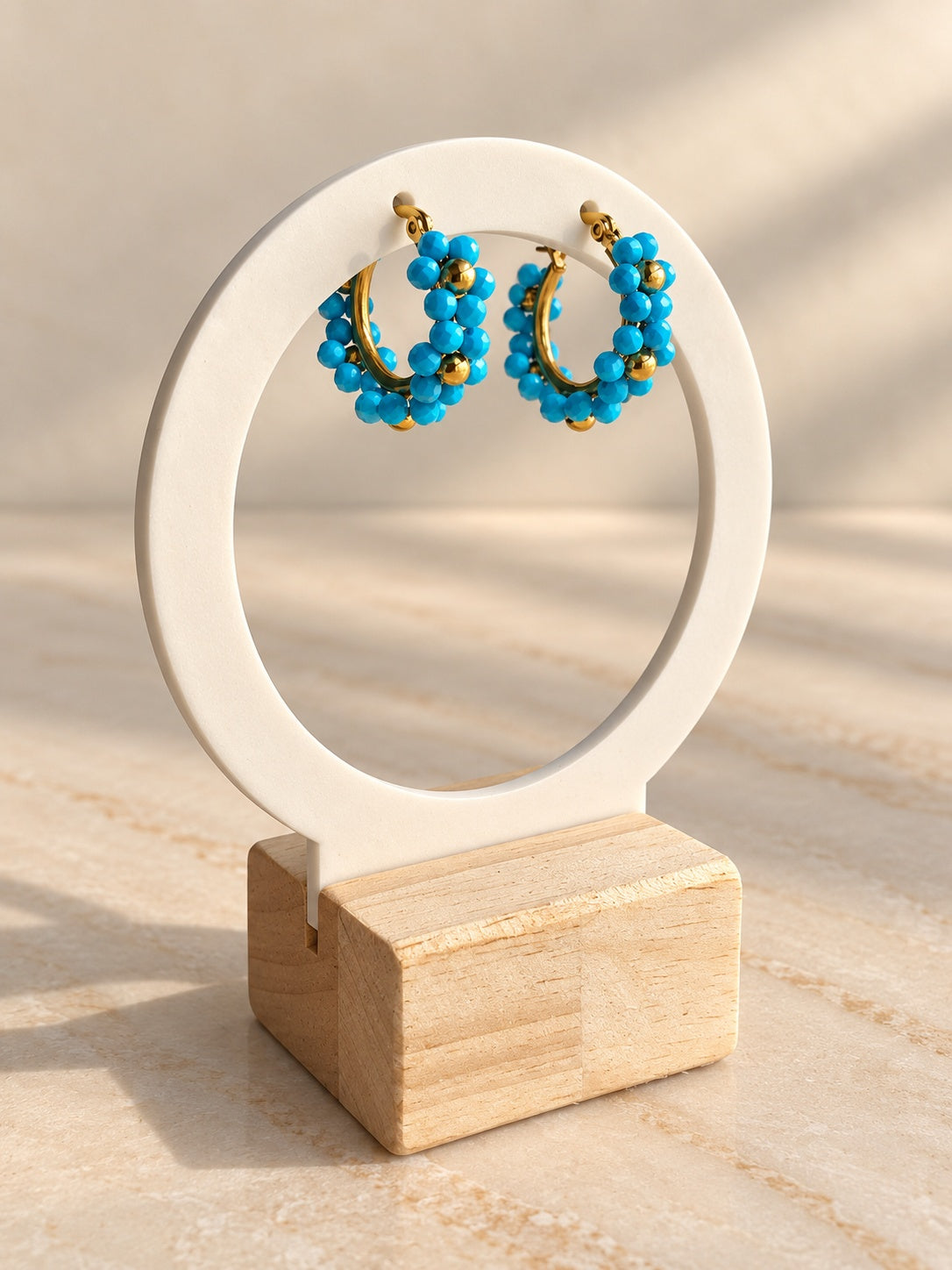 Blue beaded gold hoop earrings