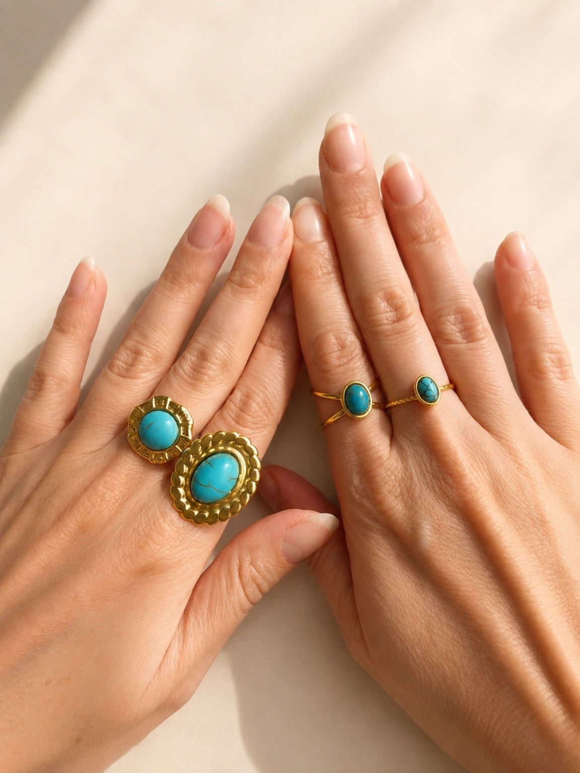 Chunky turquoise ring with 14K gold plating and a non-tarnish finish.