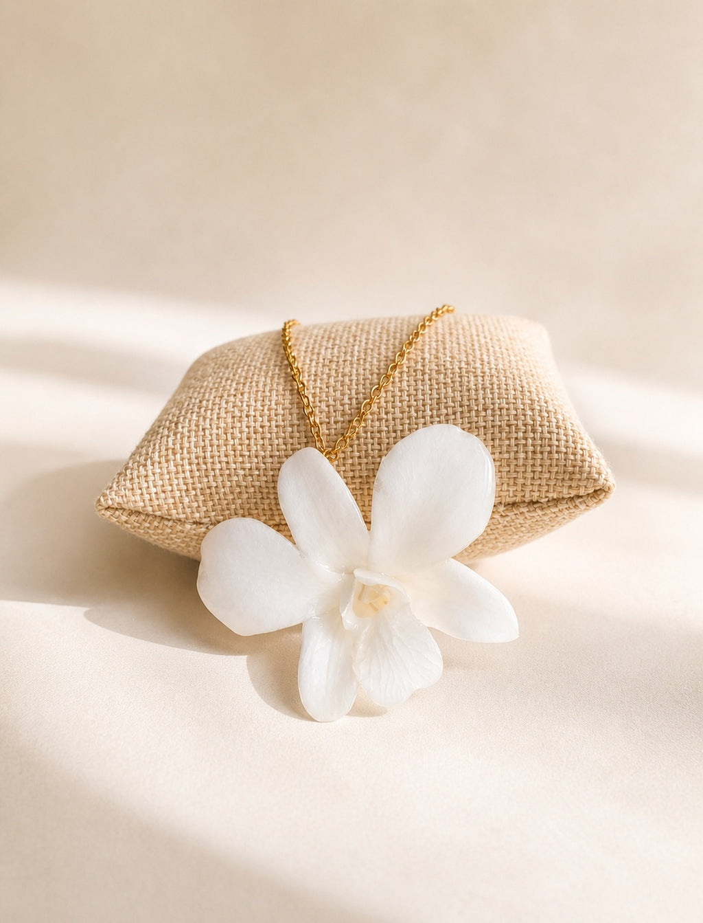 Botanical orchid necklace crafted with a real preserved flower on an 18K gold-plated chain.